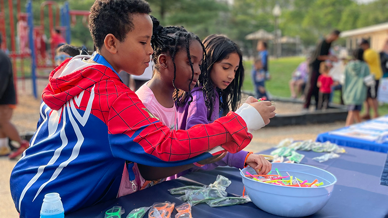 Community Cookout Photo 5 - kids enjoying the candies