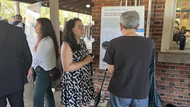 City staff discuss Hoofs Runs with community members during an open house.
