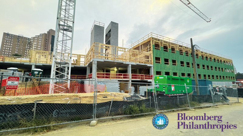 housing construction photo with city of alexandria seal and bloomberg philanthropies logo in bottom right corner